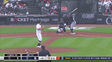 a baseball game is being played in front of a rocket mortgage ad