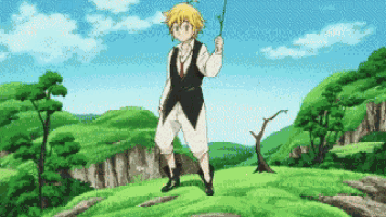a man is standing on top of a grassy hill holding a stick in his hand .