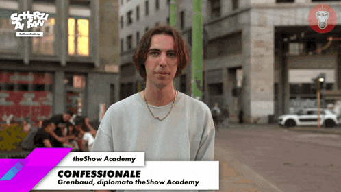 a man is standing in front of a sign that says the show academy confessionale