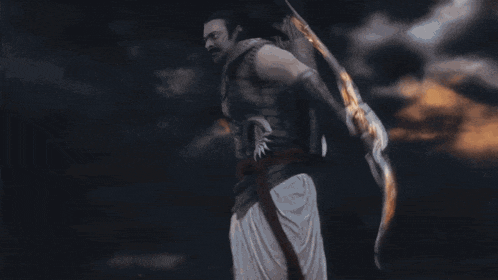 a man is holding a sword that is covered in flames