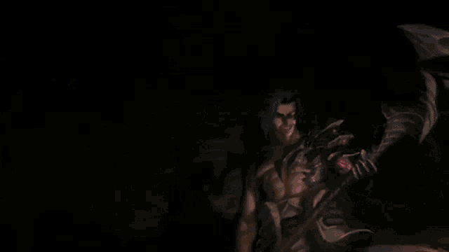 a man is holding a scythe and a glowing object in his hand in a dark room .