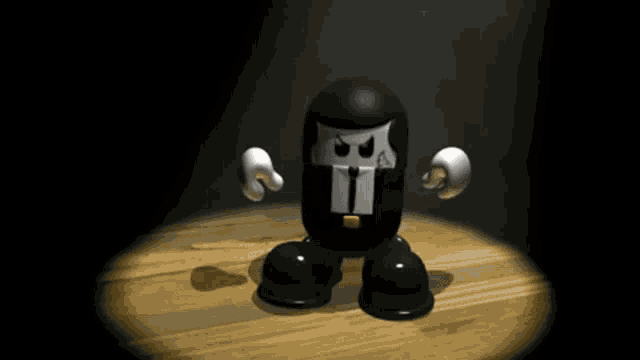 a cartoon character with a skull on his head is sitting on a table