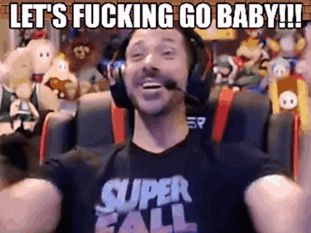 a man wearing headphones says let 's fucking go baby !!!