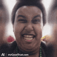 a close up of a person 's face with the website mygoodtrust.com