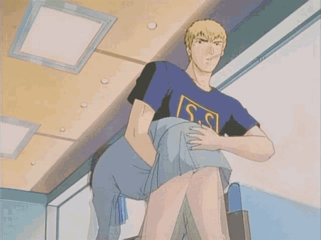 a man in a s.s. shirt is kneeling down