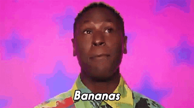 a man in a colorful shirt is saying bananas .