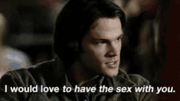 a man is sitting at a table and saying `` i would love to have the sex with you `` .