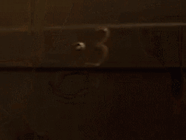 a blurred image of a door with a striped pattern