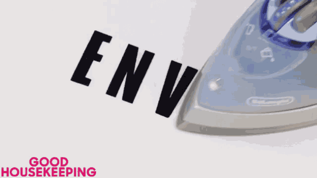 the word env is being ironed by a delonghi brand iron