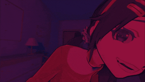 a girl in a red sweater is looking at the camera