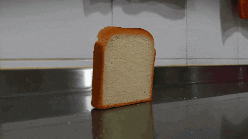 a sniper aiming at a slice of bread