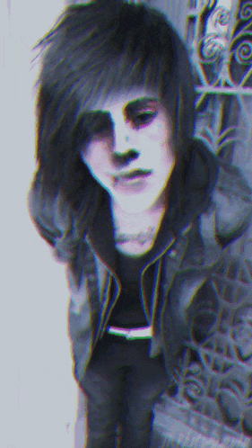 a blurry picture of a person with a hoodie on