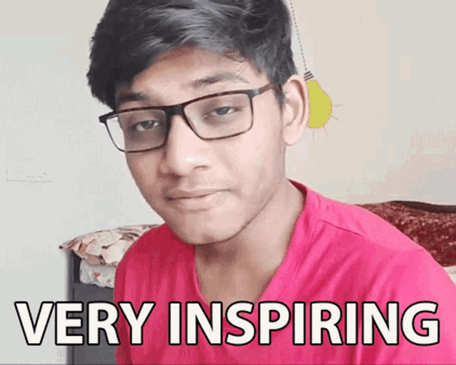 a young man wearing glasses and a red shirt with the words very inspiring written on it
