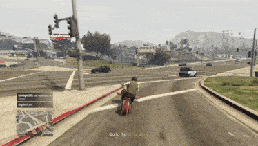 a video game screen shows a man riding a motorcycle and says " go to the trailer park "