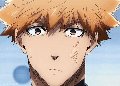 a close up of a man 's face with a tear coming out of his mouth