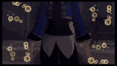 a man in a blue jacket is surrounded by gold bubbles