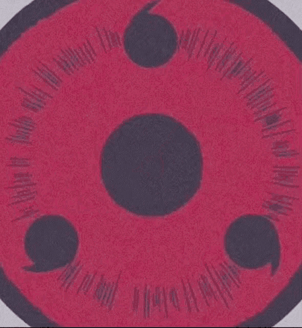 a close up of a cartoon eye with a red star in the center .
