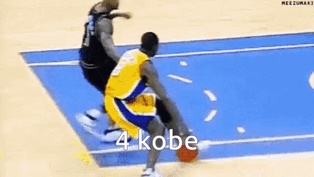 a basketball player is dribbling a basketball on a blue court while another player tries to stop him .