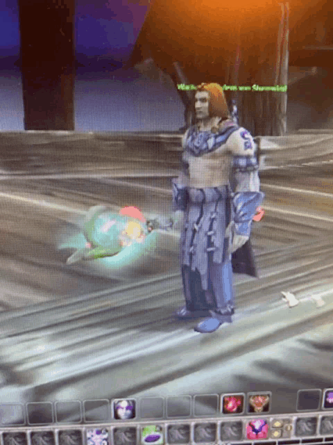 a screenshot of a video game shows a man holding a sword and a glowing flower
