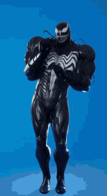 a man in a venom costume with a blue background