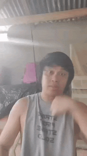 a blurry picture of a man looking at himself in the mirror .