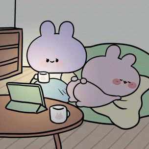 a cartoon of two rabbits sitting on a couch