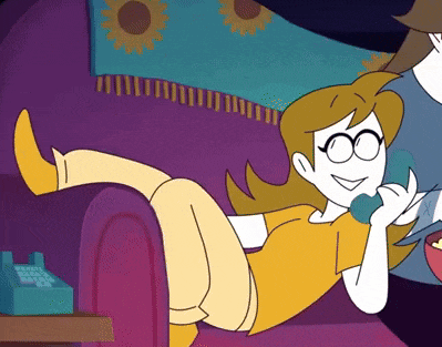 a cartoon character is laying on a couch talking on a phone
