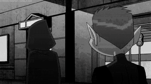 a black and white drawing of two cartoon characters standing next to each other .