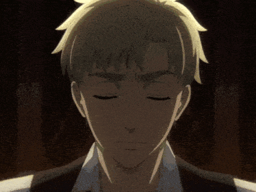 a man with his eyes closed and his mouth open