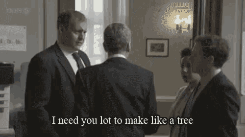 a man in a suit and tie says i need you lot to make like a tree .