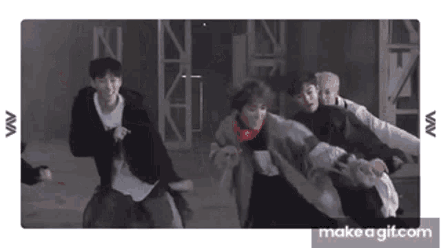 a group of people are dancing together in a room .