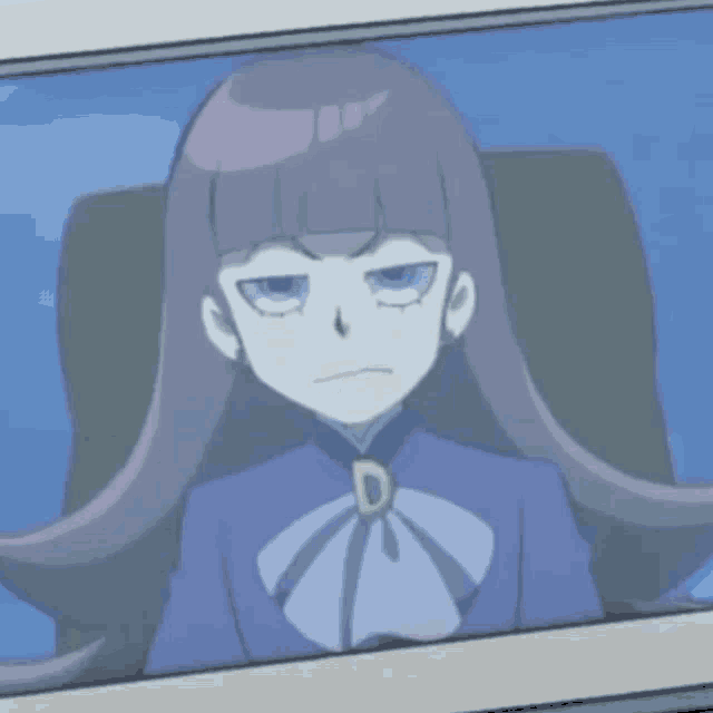 a girl in a blue shirt with the letter c on it is making a hand gesture