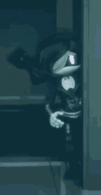 a robot is standing in a dark room .