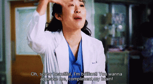 a woman in a lab coat says " oh screw beautiful i 'm brilliant "