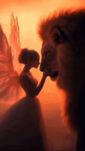 a woman with angel wings petting a lion 's face