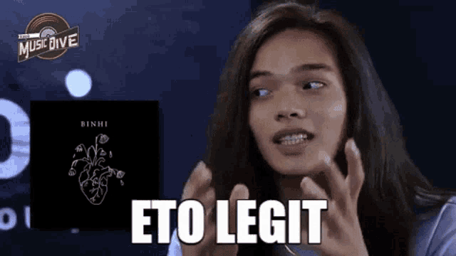 a woman says " eto legit " in front of a heart