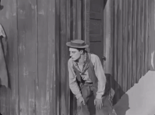 Buster Keaton Hat GIF - Buster Keaton Hat Wind GIFs