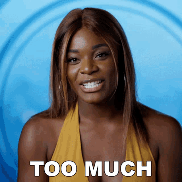 a woman in a yellow top says " too much " in white letters