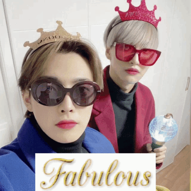 two people wearing sunglasses and crowns standing next to a sign that says " fabulous "