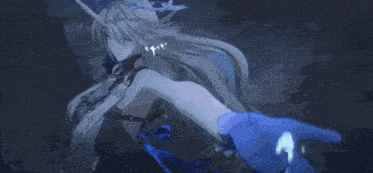 a person is holding a blue object in their hand .