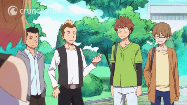 a group of people standing in front of a crunchyroll ad