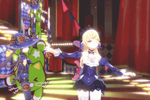 a girl in a blue dress is dancing in front of a green stuffed animal