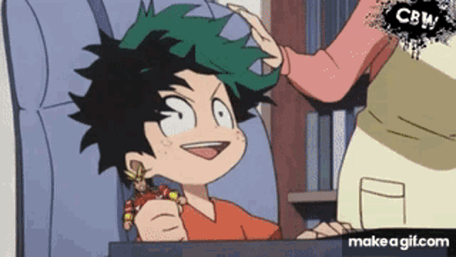 a woman is putting a candy on a child 's head