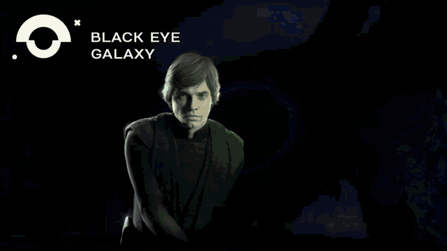 a blurred image of a person holding a green light saber with the words black eye galaxy written on the bottom