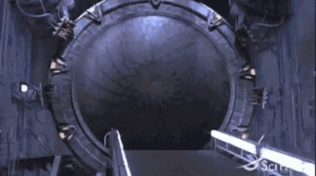 a stargate with a light coming out of it and the letters sc on the bottom