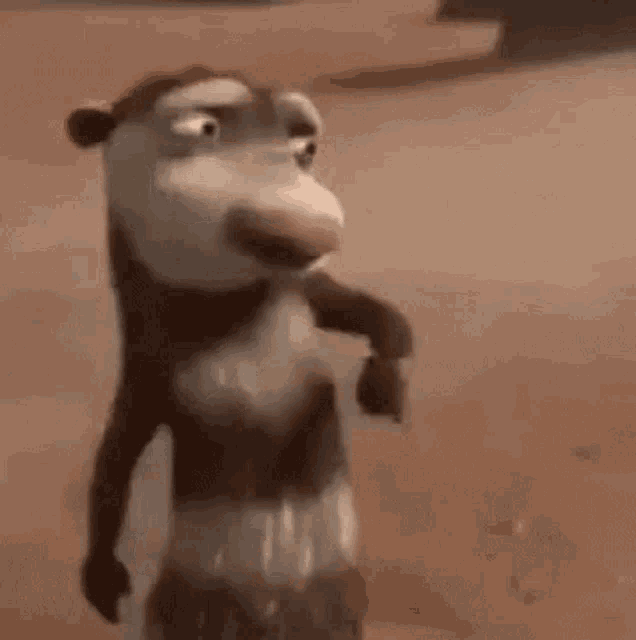 a close up of a cartoon opossum standing on a dirt road .