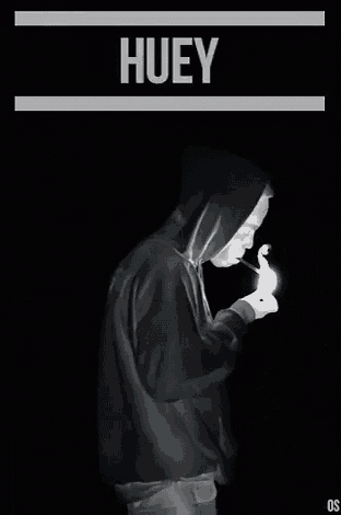 a black and white photo of a man lighting a cigarette with the words grown ups written above him