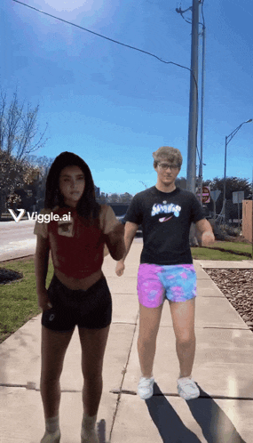a man wearing a shirt that says saving is holding a woman 's hand on a sidewalk