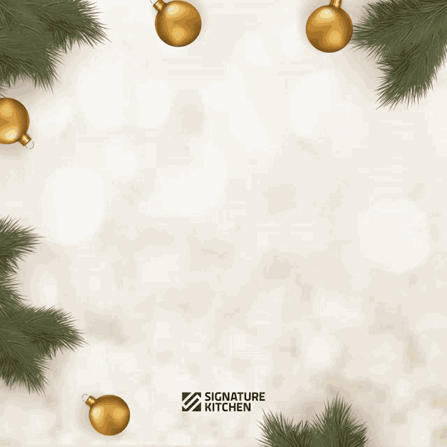 a merry signature kitchen christmas card with gold balls and pine branches