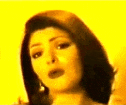 a close up of a woman 's face with a yellow background and a yellow background .
